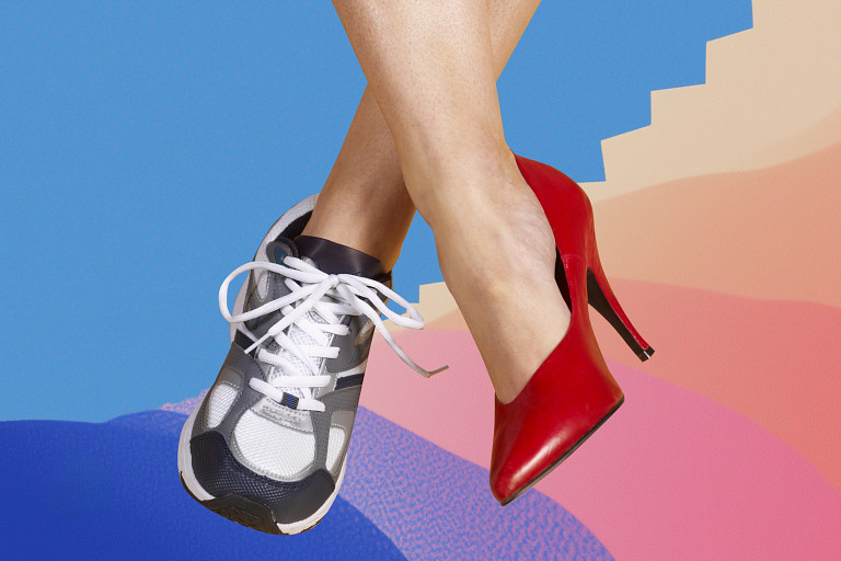 A pair of crossed legs wearing mismatched shoes—one black-and-white athletic sneaker and one bright red high heel—against a colorful abstract background of blue, pink, and beige shapes, symbolizing balance between work and personal life.